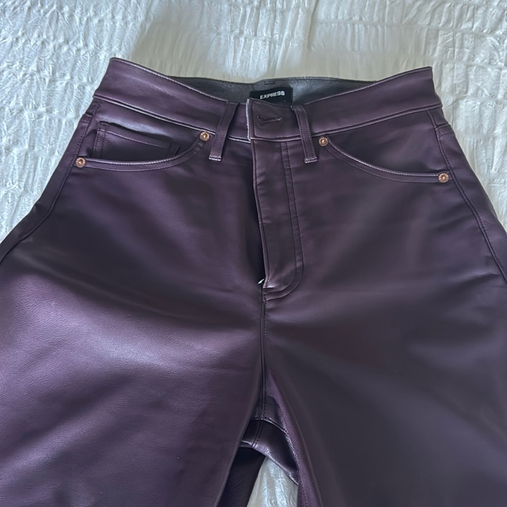 Express faux leather size 4R. Never work. Boot cut style. Color plum